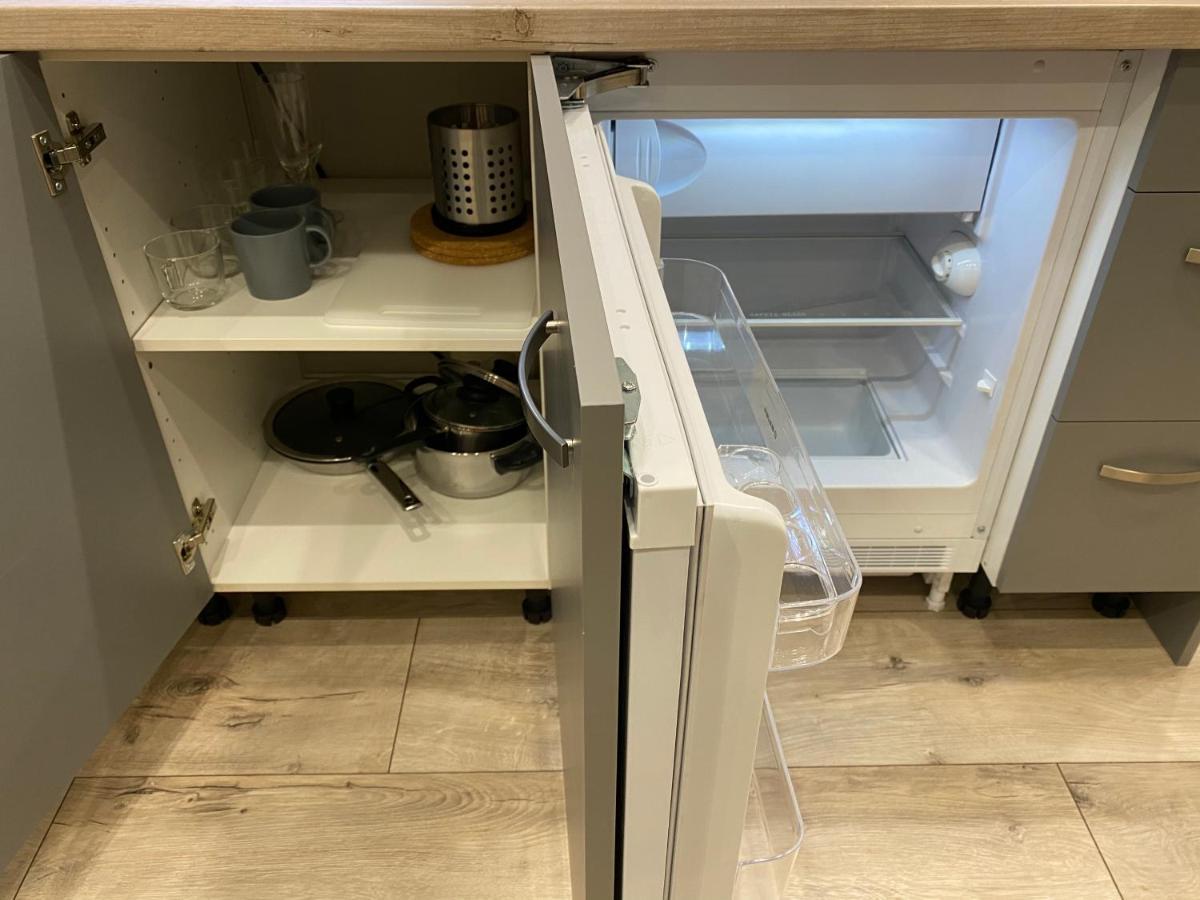 Aparthotel 리가 외부 사진 A refrigerator with a built-in ice maker