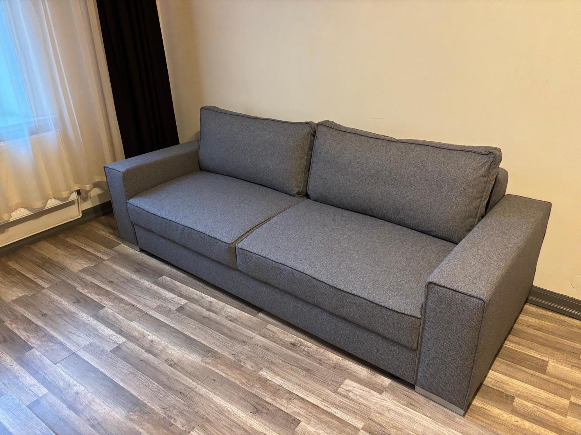 Aparthotel 리가 외부 사진 A sofa